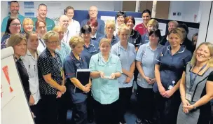  ?? Staff from Southport and Ormskirk NHS Trust with their trophy, after being named Most Improved Trust for A&E waiting times ??