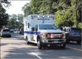  ?? Christian Abraham / Hearst Connecticu­t Media ?? An ambulance leaves the scene of an accident last month.