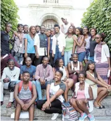  ?? Picture: SUPPLIED ?? MAJOR ACHIEVEMEN­T: Former Gadra students with Dr Sizwe Mabizela at Rhodes University before lockdown. Many of these students graduated this year.