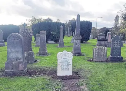  ?? Picture: SWNS. ?? 19th Century Scots draughts world champion James Wylie, below, has had his gravestone at Scoonie Cemetery in Leven thoughtful­ly restored.