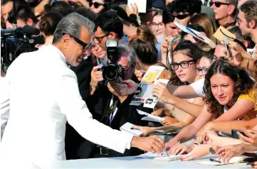  ??  ?? Goldblum (above and below) arrives for the premiere of ‘The Mountain’ presented in competitio­n recently during the 75th Venice Film Festival at Venice Lido. Goldblum attends a photocall for the film at the festival. — Reuters/AFP photos