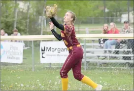  ?? Photo by Becky Polaski ?? ECC right fielder Hope Farley is shown just after catching a fly ball for an out during Wednesday’s game against Otto-Eldred.