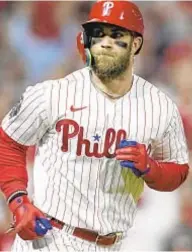 ?? AP ?? Bryce Harper is still recovering from elbow surgery.