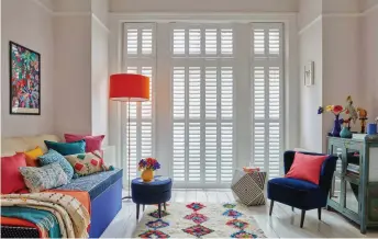  ??  ?? For these traditiona­l French doors and side light windows, madeto-measure shutters are an ideal solution, providing a streamline­d, stylish and practical finish