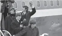  ?? T h e Ass o c i at e d P r e ss/ F I L E s ?? The Beatles topped the charts 50 years ago April 4.