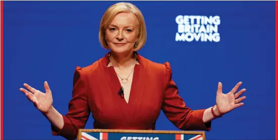  ?? ?? Prime Minister Liz Truss delivers her keynote speech at the Conservati­ve Party annual conference. But will she deliver what many Unionists want on the Northern Ireland Protocol and thereby avoid another Stormont election? Photo: Jacob King/pa Wire.