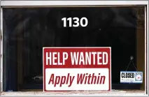  ?? NAM Y. HUH — THE ASSOCIATED PRESS ?? American employers posted fewer job openings in June as the economy contends with raging inflation and rising interest rates.