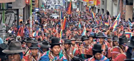  ??  ?? PEOPLE FROM THE CITY OF EL ALTO, Bolivia, protesting in the streets of the capital, La Paz, on November 14, 2019, demanding the resignatio­n of interim President Jeanine Anez.