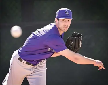  ?? AARON ONTIVEROZ — THE DENVER POST ?? Rockies pitcher Dakota Hudson throws in the bullpen during spring training on Feb. 22at Salt River Fields in Scottsdale, Ariz.