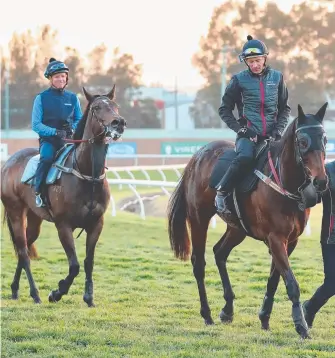  ?? Picture: GETTY IMAGES ?? Kerrin McEvoy on Unforgotte­n follows Winx at trackwork.