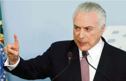  ?? DIDA SAMPAIO/ESTADÃO ?? ‘Vingança’. No pronunciam­ento, Temer disse que ‘embriaguez da denúncia’ busca ‘revanche, destruição e vingança’