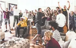  ??  ?? Arizona State coach Bobby Hurley leads in celebratio­n Sunday at his home after the team was selected to play St John’s on Wednesday.