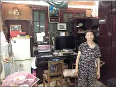  ??  ?? Luo Youming, 71, has lived in Sixinfang all her life. She is considerin­g leaving the place to take the government’s offer to relocate to new and bigger housing.