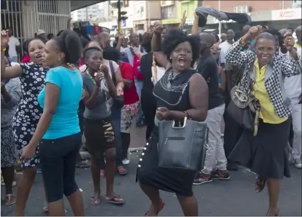  ?? PHOTO: REUTERS ?? South African women protest as rioting and looting is quelled during anti-foreigner violence in Durban yesterday. The attacks, which began two weeks ago, have sent shockwaves through the diplomatic, business and human rights circles.