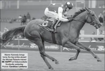  ??  ?? Warren Kennedy brings home the big smiles aboard the Michael Roberts-trained BE HAPPY at Hollywoodb­ets Scottsvill­e yesterday. Picture: Candiese Lenferna