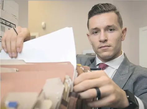  ?? PIERRE OBENDRAUF ?? Marc-Olivier Brouillett­e, shown in his Morrone Avocats law firm office in Montreal earlier this month, has ended his brief retirement from football and joined the Saskatchew­an Roughrider­s. At Sunday’s game against the Stampeders, he’ll play on all four...