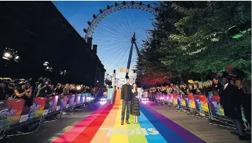  ??  ?? The London Eye is decked out for the newTrolls film. Rates at the landmark are set to rise by 70pc as the capital suffers the worst effects of the Government’s decision to increase the tax from next April