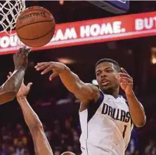  ?? EPA PIC ?? Dallas Mavericks guard Dennis Smith Jr (right) attempts a shot during their NBA game against Golden State Warriors on Thursday.
