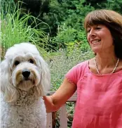  ??  ?? Woman’s best friend: Writer Amanda Brookfield with golden doodle Mabel