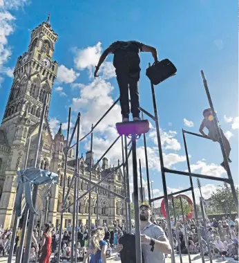  ?? ?? ‘TIME TO SHINE’: Theatre and performanc­e art in 2022 to mark Bradford’s City of Culture for 2025 award. Naz Shah, the Bradford West Labour MP, says: ‘Winning 2025 was huge for the city. It’s our time to shine.’