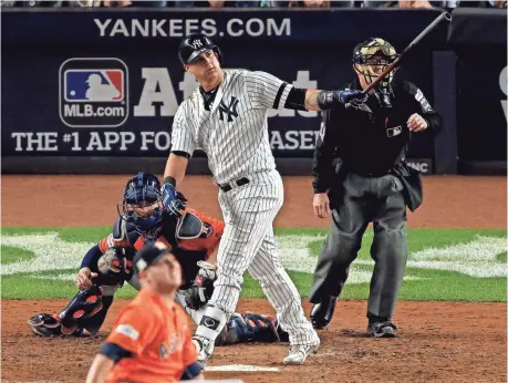  ?? ADAM HUNGER, USA TODAY SPORTS ?? Gary Sanchez goes 2-for-4, including a solo home run in the seventh inning, as the Yankees defeat the Astros 5-0 Wednesday.