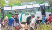  ?? HT PHOTO ?? The bus that rolled down a gorge near Dhaliara in Kangra district, 60km from Dharamshal­a, on Thursday.