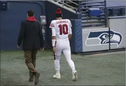  ?? SCOTT EKLUND — THE ASSOCIATED PRESS FILE ?? San Francisco 49ers quarterbac­k Jimmy Garoppolo (10) walks to the locker room during the second half against the Seattle Seahawks on Sunday, Nov. 1, 2020, in Seattle.