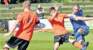  ?? United’s Richard Brodie shoots at goal during last Saturday’s encounter with Glossop North End. John Driscoll ??