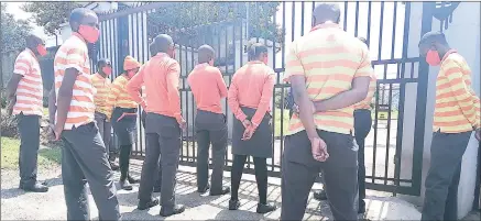 ?? (Pic: Nhlanganis­o Mkhonta). ?? The Big Tree Galp Filling Station employees who went to deliver a petition to the Prime Minister’s Office, waiting to be attended by officials.