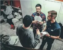  ?? CAT'S EYE CINEMA ?? Director Cody Westman, centre facing, discusses a scene on set.