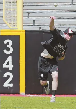  ?? STAFF PHOTOS BY MATT WEST ?? RETURN ENGAGEMENT: Outfielder Charlie McConnell — whose 76 hits lead the Huskies — and Northeaste­rn took one of three against Auburn, its first opponent in the NCAA regionals, when the teams played in March.