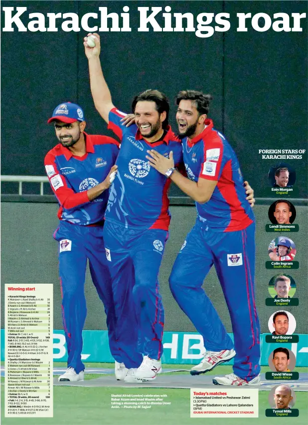  ?? Photo by M. Sajjad ?? Shahid Afridi (centre) celebrates with Babar Azam and Imad Wasim after taking a stunning catch to dismiss Umer Amin. —