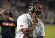  ?? KARL B DEBLAKER - THE ASSOCIATED PRESS ?? Syracuse coach Dino Babers watches a replay on the scoreboard during the second half of the team’s NCAA college football game against North Carolina State in Raleigh, N.C., Thursday, Oct. 10, 2019.