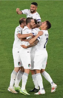  ??  ?? Italy forward Lorenzo Insigne (top) and teammates celebrate a goal against Turkey in their Euro Group ‘A’ match at the Olympic Stadium in Rome on Friday. —