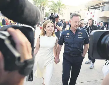  ?? ?? Red Bull team principal Christian Horner and his Spice Girl wife Geri in the paddock in Bahrain