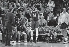  ?? Brandon Dill / Associated Press ?? Golden State’s Draymond Green reacts after being ejected during the first half of Game 1 of the East semifinal series against Memphis on Sunday.