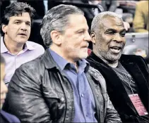  ?? Getty Images ?? HE’S BACK: Charles Oakley, in the midst of a feud with James Dolan, watches Thursday’s Knicks game in Cleveland with Cavaliers owner Dan Gilbert.