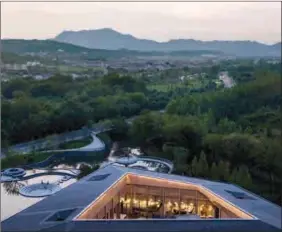  ??  ?? Lacime Architects’ MOMA Lotus Resort at Jiuhua Mountain, in Anhui province, successful­ly blends with its surroundin­gs.