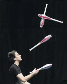  ??  ?? A Cirque du soleil juggler rehearses back stage in preparatio­n for the show Corteo at Little Caesars Arena in Detroit.