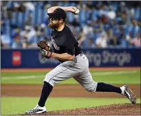  ?? JON BLACKER — THE CANADIAN PRESS ?? Indians reliever Bryan Shaw pitches during the eighth inning.