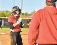  ?? MIKE CAUDILL/STAFF ?? Retiring from coaching baseball at Nansemond River means Mark Stuffel will have more time to watch his daughter, Cammie, shown in April, play softball. Both the baseball and softball teams are ranked fifth in Hampton Roads.
