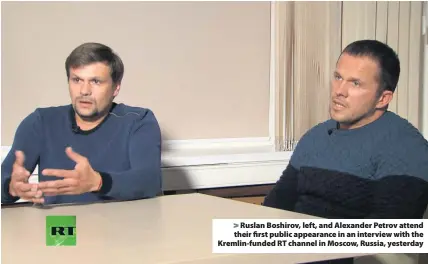  ??  ?? &gt; Ruslan Boshirov, left, and Alexander Petrov attend their first public appearance in an interview with the Kremlin-funded RT channel in Moscow, Russia, yesterday