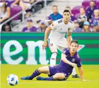  ?? REINHOLD MATAY/USA TODAY SPORTS When: Where: Watch: The Buzz: ?? Orlando City midfielder Will Johnson (bottom) and Real Salt Lake midfielder Damir Kreilach battle for the ball. Johnson said the Lions have struggled to cope with losses this season.