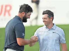  ?? ADAM HAGY/ USA TODAY SPORTS ?? Jon Rahm, left, and Rory McIlroy battled for years on the PGA Tour. Rahm will play the LIV tour beginning this year.