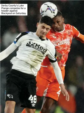  ?? ?? Derby County’s Luke Plange competes for a header against Blackpool on Saturday.