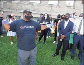  ?? Ned Gerard / Hearst Connecticu­t Media ?? The Rev. William McCullough of FaithActs speaks at a rally in front of Bridgeport City Hall on July 13.