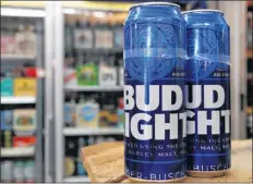  ?? AP PHOTO ?? Starting next month, packages of Bud Light will have prominent labels showing the beer’s ingredient­s and calories as well as the amount of fat, carbohydra­tes and protein in a serving.