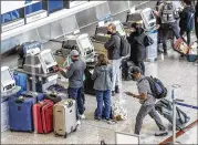  ?? JOHN SPINK/AJC 2021 ?? The pandemic has exacerbate­d issues consumers face with airlines. A report says complaints tied to refunds have run higher in 2021 than pre-pandemic levels.