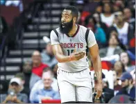  ?? TROY TAORMINA / USA TODAY SPORTS ?? Houston Rockets guard James Harden reacts during Sunday’s victory over the Cleveland Cavaliers at Toyota Center in Houston.