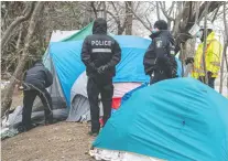  ?? DAVE SIDAWAY FILES ?? An Instagram post regarding the dismantlin­g of an encampment on Notre-dame St. led to a community group being blocked by the office of Mayor Valérie Plante.